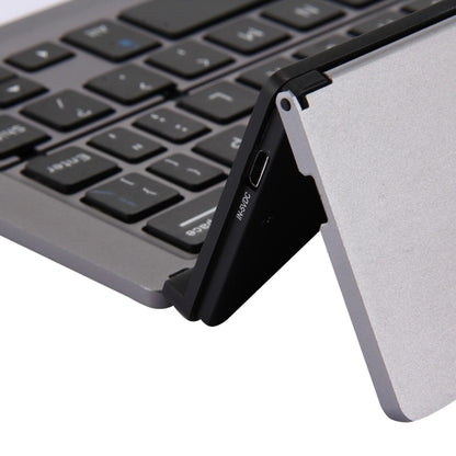F18 Ultra-slim Rechargeable Foldable 58 Keys Bluetooth Wireless Keyboard with Holder