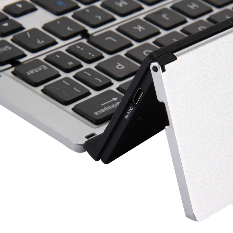F18 Ultra-slim Rechargeable Foldable 58 Keys Bluetooth Wireless Keyboard with Holder
