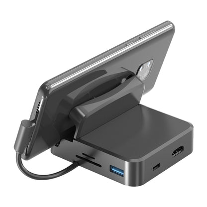 7 vienā USB-C / C tipa uz 2 USB 2.0 + USB 3.0 + 4K HDMI + SD / TF kartes slots + PD USB-C / C tipa uzlādes porti Daudzfunkcionāla centrmezgla dokstacija ar turētāju